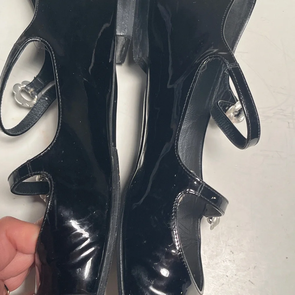 CHANEL Black Patent Leather Flats with Silver Floral Accents - Picture 4 of 14
